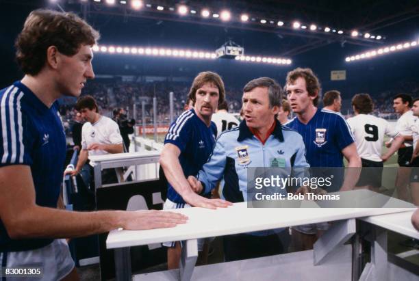 Ipswich Town coach Charlie Woods with Terry Butcher , Frans Thjssen and Steve McCall during the half-time interval in their six-a-side match against...