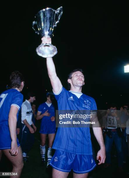 Everton's Peter Reid holding the trophy after their UEFA European Cup Winners Cup Final victory over Rapid Vienna in Rotterdam, May 15th 1985....