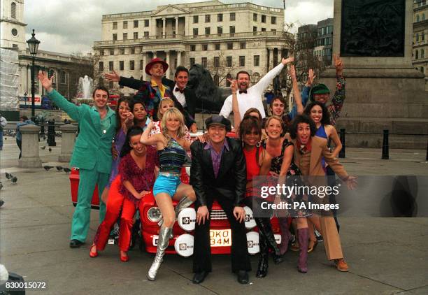 Richie AND A FELLOW CAST MEMBERS PROMOTE THE NEW MUSICAL "BOOGIE NIGHTS" AT A PHOTOCALL IN LONDON'S TRAFALGAR SQUARE.