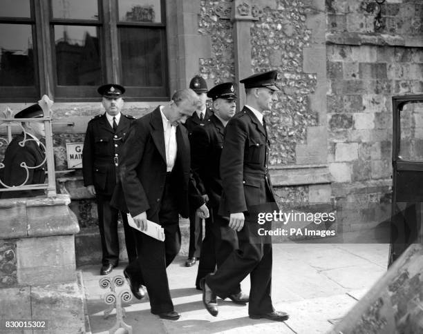 John Thomas Straffen leaving Winchester Crown Court after the first day's hearing charged him with murdering five year old Linda Bowyer who was found...