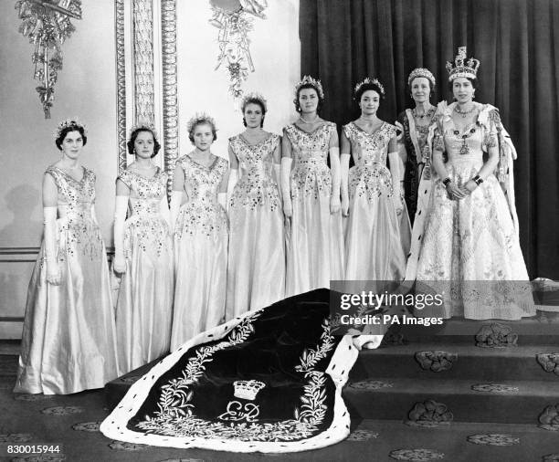 Queen Elizabeth II at Buckingham Palace with her maids of honour after her coronation in Westminster Abbey