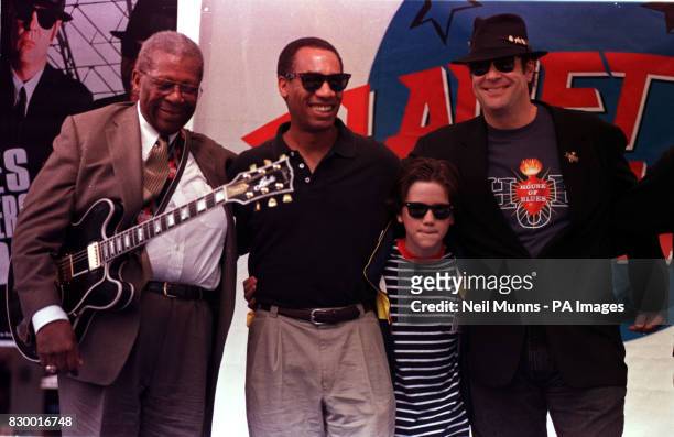 The cast of Blues Brothers 2000, Dan Ackroyd , J. Evan Bonifant and Joe Morton are joined by veteran blues guitarist B.B. King at Planet Hollywood in...