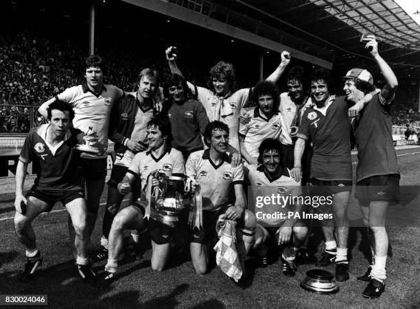 PA NEWS PHOTO 14/5/79 ARSENAL CELEBRATE AFTER BEATING MANCHESTER UNITED IN THE F.A. CUP FINAL 3-2 AT WEMBLEY, LONDON. STANDING FROM LEFT TO RIGHT:...