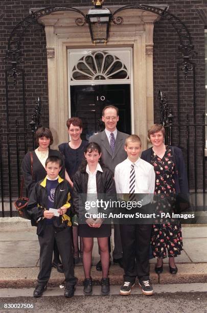 John Swinney accompanies schoolchildren from his Tayside North constituency, Deane Ferguson , with his mother Elaine, Suzanne May with mother...