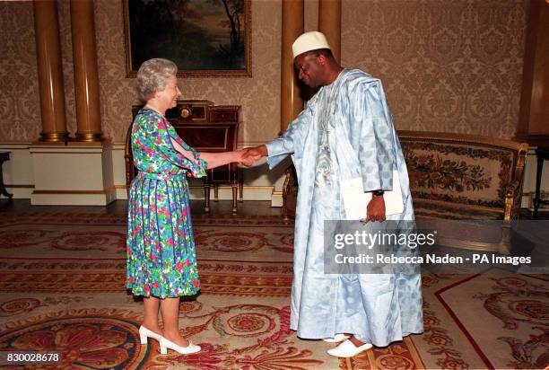 The Queen receives His Excellency the Ambassador of Guinea, Monsieur Ibrahima Sylla, at Buckingham Palace today . Rota picture by Rebecca Naden/PA