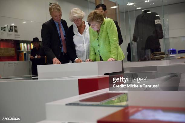 German Chancellor Angela Merkel visits with Monika Gruetters federal commissioner for Culture and Media and Hubertus Knabe Director of the Stasi...