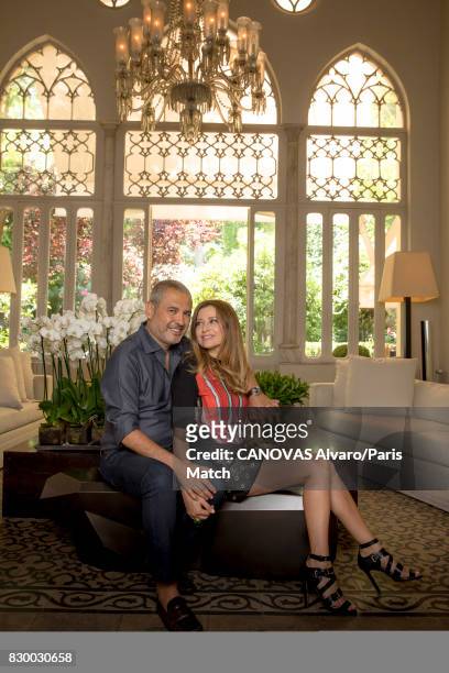 Fashion designer Elie Saab is photographed at home with his wife Claudine for Paris Match on June 24, 2017 in Beirut, Lebanon.