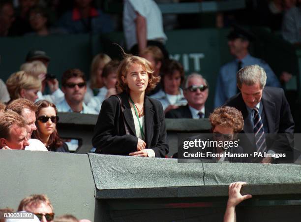 PA NEWS PHOTO 27/6/98: LUCY HEALD, THE GIRLFRIEND OF BRITISH TENNIS STAR TIM HENMAN TAKES HER SEAT ON CENTRE COURT DURING THE 1998 WIMBLEDON TENNIS...