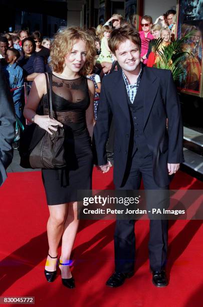 PA NEWS PHOTO 21/07/98 DEC, OF DUO 'ANT & DEC', ARRIVES WITH HIS GIRLFRIEND, ACTRESS CLAIRE BUCKFIELD, AT THE CELEBRITY PREMIERE OF THE NEW MUSICAL...