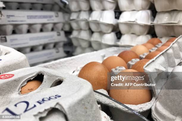 Cartons of eggs are pictured for sale on the shelves of a supermarket in Hong Kong on August 11, 2017. The EU on August 11 called an emergency...