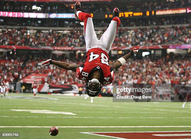 Wide receiver Roddy White of the Atlanta Falcons does a back-flip to celebrate his touchdown in the first quarter against the Kansas City Chiefs at...