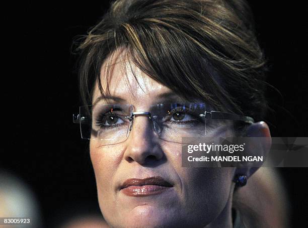 Republican vice presidential candidate Alaska Gov. Sarah Palin watches Republican presidential nominee John McCain's address to the Clinton Global...