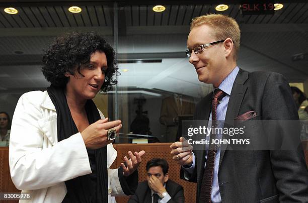 Belgian Minister of Immigration Annemie Turtelboom chats with her Swedish counterpart Tobias Billstrom prior to their meeting Justice and Internal...