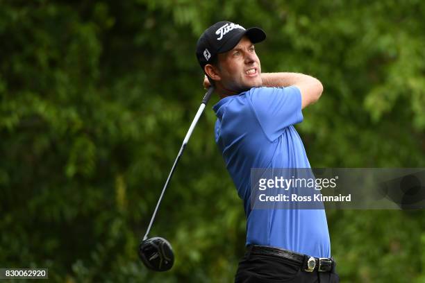 Webb Simpson of the United States plays his shot from the 12th tee during the second round of the 2017 PGA Championship at Quail Hollow Club on...