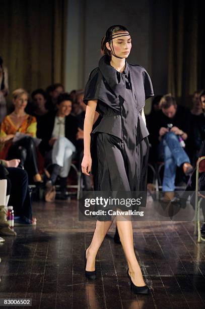 Model walks the runway wearing the Ana Sekularac Spring/Summer 2008/2009 collection during London Fashion Week on September 17, 2008 in London,...