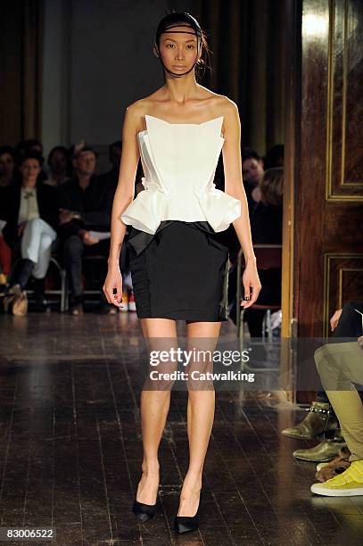 Model walks the runway wearing the Ana Sekularac Spring/Summer 2008/2009 collection during London Fashion Week on September 17, 2008 in London,...