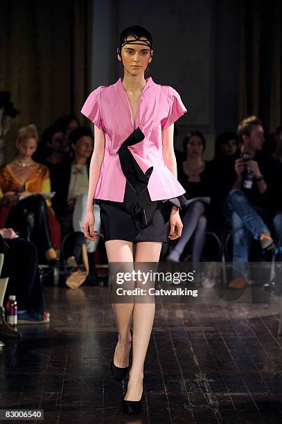 Model walks the runway wearing the Ana Sekularac Spring/Summer 2008/2009 collection during London Fashion Week on September 17, 2008 in London,...