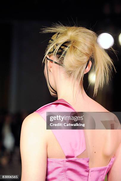 Model walks the runway wearing the Ana Sekularac Spring/Summer 2008/2009 collection during London Fashion Week on September 17, 2008 in London,...