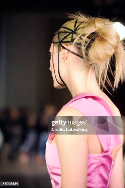 Model walks the runway wearing the Ana Sekularac Spring/Summer 2008/2009 collection during London Fashion Week on September 17, 2008 in London,...