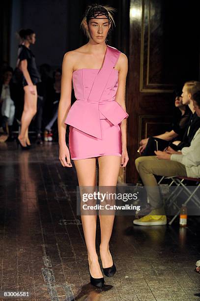 Model walks the runway wearing the Ana Sekularac Spring/Summer 2008/2009 collection during London Fashion Week on September 17, 2008 in London,...