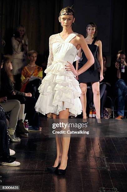 Model walks the runway wearing the Ana Sekularac Spring/Summer 2008/2009 collection during London Fashion Week on September 17, 2008 in London,...