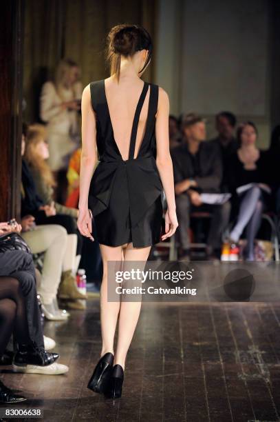 Model walks the runway wearing the Ana Sekularac Spring/Summer 2008/2009 collection during London Fashion Week on September 17, 2008 in London,...