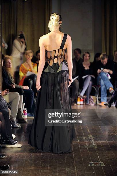 Model walks the runway wearing the Ana Sekularac Spring/Summer 2008/2009 collection during London Fashion Week on September 17, 2008 in London,...