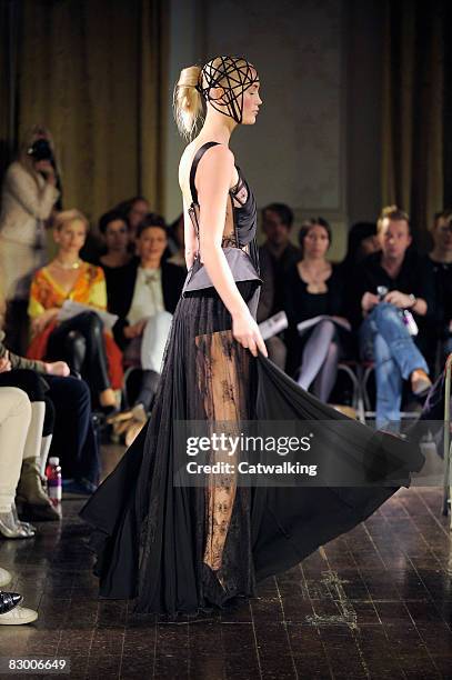 Model walks the runway wearing the Ana Sekularac Spring/Summer 2008/2009 collection during London Fashion Week on September 17, 2008 in London,...