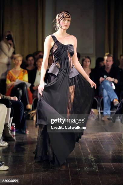 Model walks the runway wearing the Ana Sekularac Spring/Summer 2008/2009 collection during London Fashion Week on September 17, 2008 in London,...