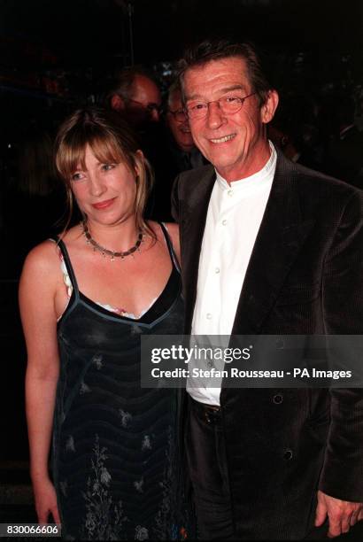 ACTOR JOHN HURT AT THE UK PREMIERE OF STEVEN SPIELBERG'S FILM 'SAVING PRIVATE RYAN' AT THE EMPIRE IN LONDON'S LEICESTER SQUARE.