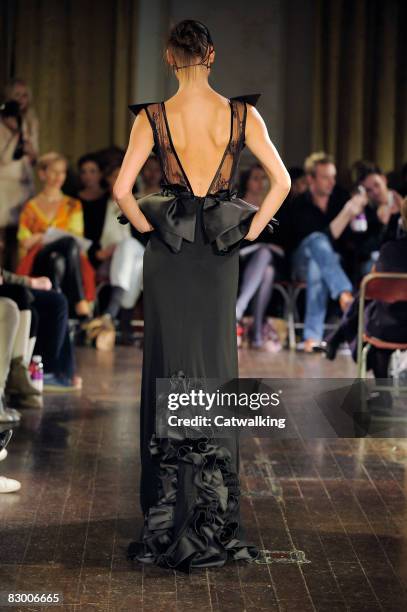 Model walks the runway wearing the Ana Sekularac Spring/Summer 2008/2009 collection during London Fashion Week on September 17, 2008 in London,...