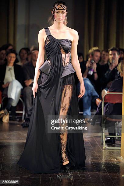 Model walks the runway wearing the Ana Sekularac Spring/Summer 2008/2009 collection during London Fashion Week on September 17, 2008 in London,...