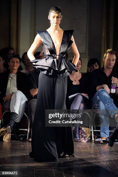 Model walks the runway wearing the Ana Sekularac Spring/Summer 2008/2009 collection during London Fashion Week on September 17, 2008 in London,...