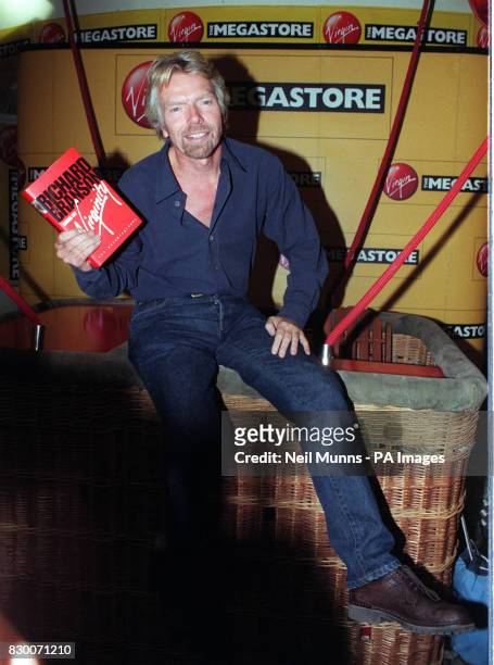PA NEWS 17/9/98 VIRGIN BOSS AND ADVENTURER RICHARD BRANSON SITS IN A BALLOON BASKET AT A VIRGIN MEGASTORE IN LONDON, WHERE HE SIGNED COPIES OF HIS...