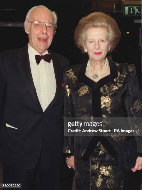 Former British Prime Minister and Conservative Party leader Baroness Margaret Thatcher accompanied by her husband Denis arrive at the Savoy Hotel in...