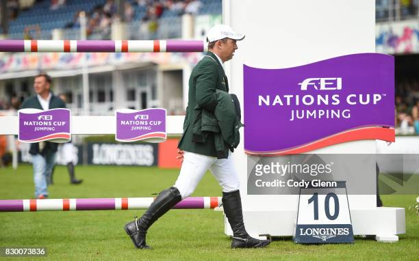 Dublin , Ireland - 11 August 2017; Cian O'Connor of Ireland walks the course ahead of the FEI Nations Cup during the Dublin International Horse Show...