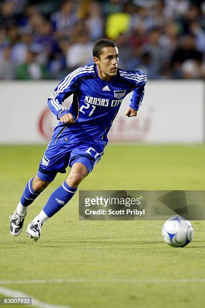 Herculez Gomez of the Kansas City Wizards dribbles the ball against Toronto FC during the game at Community America Ballpark on September 20, 2008 in...