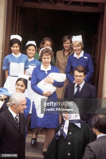 SMILING AS SHE LEAVES ST MARY'S HOSPITAL, PADDINGTON WITH HER TWO-DAY-OLD BABY SON . PRINCESS ANNE CHATS TO MR GEORGE PINKER, THE QUEENS...