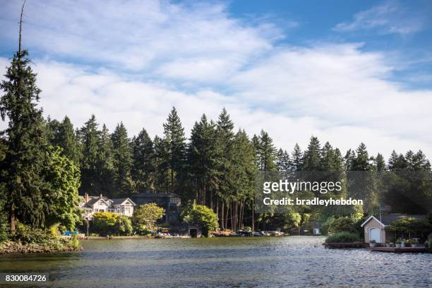luxury homes along the shores of lake oswego, oregon - waterfront house stock pictures, royalty-free photos & images