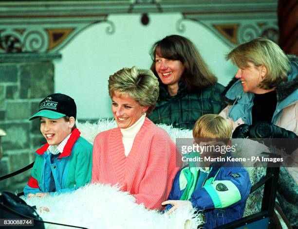 The Princess of Wales and her two sons, Princess William and Prince Harry, ride in a horse-drawn sleigh as they leave their hotel in Lech, Austria....
