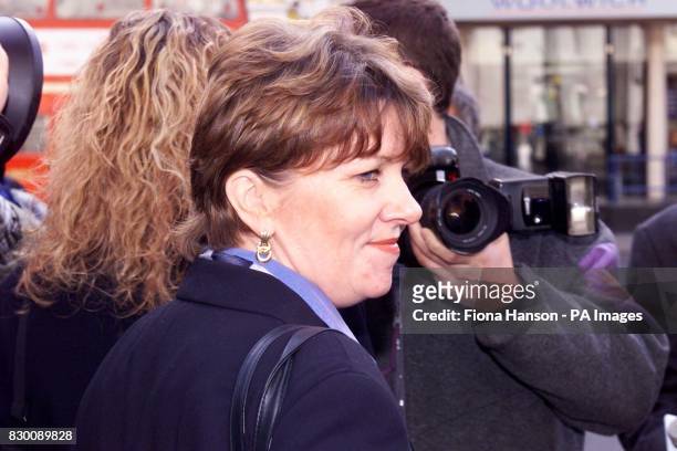 Laura Dyer a former undercover detective with the Metropolitan Police leaves the High Court in London Monday October 26, 1998 after being awarded...