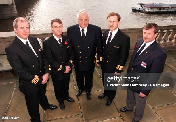 The Shipwrecked Mariners Society held its Annual General Meeting and awards ceremony in London today . Left to right Captain Norman Leask, Paul...