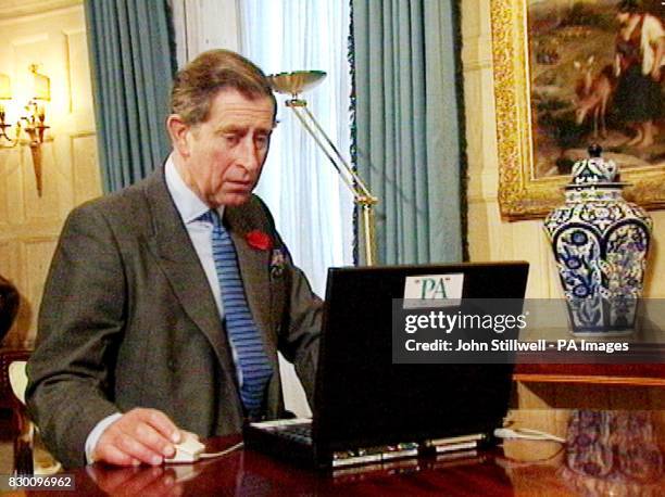 Britain's Prince of Wales checks the content of his new web site which is launched Tuesday November 10, 1998. The site - which includes 354 pages and...