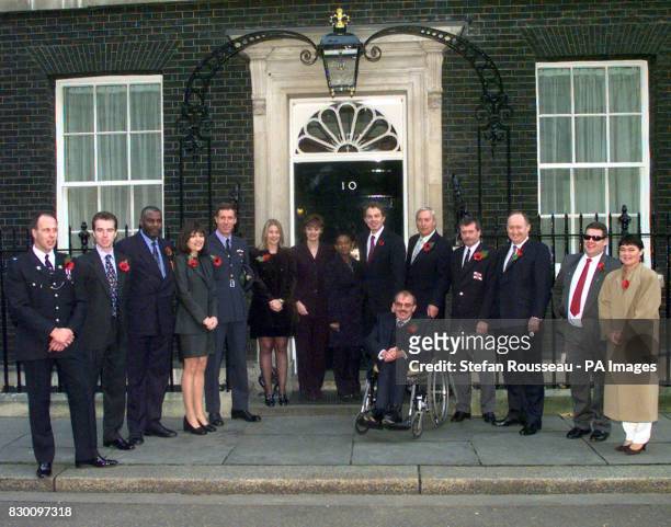 Prime Minister Tony Blair and wife Cherie meet the winners and organisers of the 1998 RADAR outside 10 Downing Street today . Pictured from left to...
