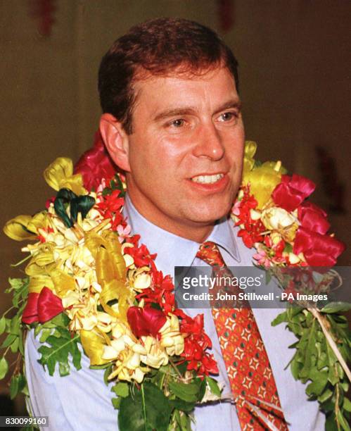 The Duke of York wearing a garland of flowers, presented on his arrival at the Tongan fisheries research centre, this afternoon . The Duke started a...