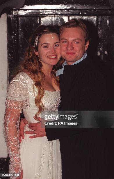 Kate Winslet and new husband Jim Threapleton at their wedding reception in the Crooked Billet pub in Stoke Row, Oxfordshire.