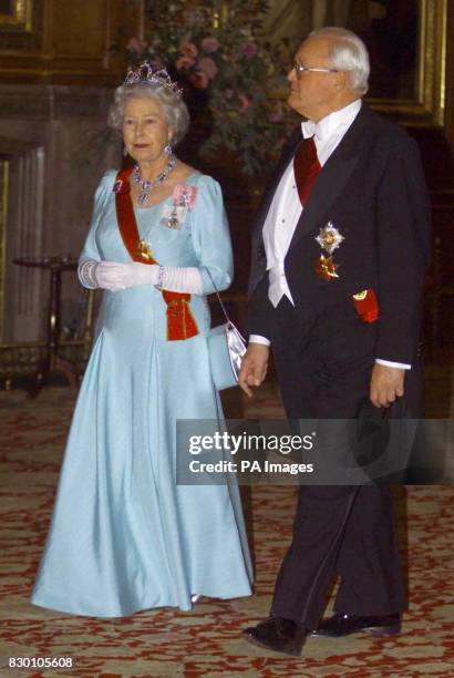 The Queen walks with German President Roman Herzog through Waterloo Chamber prior to the State Dinner held at Windsor Castle this evening . Herzog is...