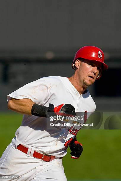 Ryan Ludwick of the St. Louis Cardinals rounds the bases after hitting a solo home run against the Arizona Diamondbacks at Busch Stadium on September...
