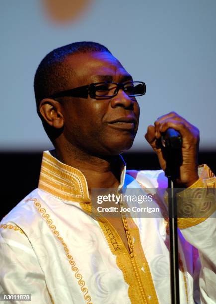 Senegalese singer and percussionist Youssou N'Dour performs at the Knock Out Poverty event to benefit All For Africa at the Hammerstein Ballroom on...