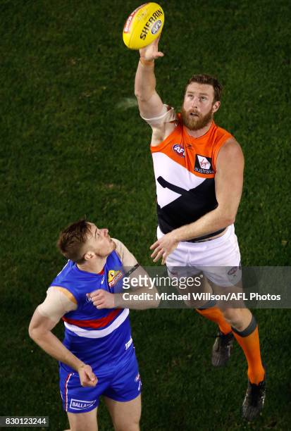 Dawson Simpson of the Giants and Jordan Roughead of the Bulldogs compete in a ruck contest during the 2017 AFL round 21 match between the Western...